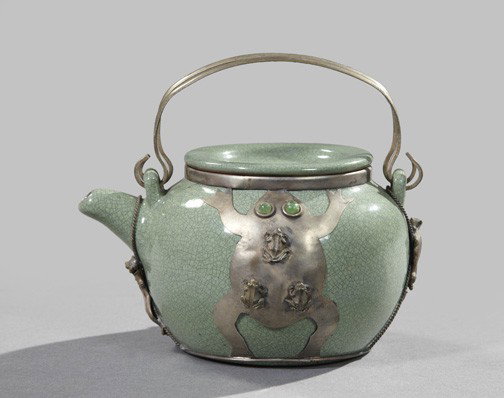 I-Ching Solitaire Teapot,: I-Ching Solitaire Teapot, the celadon green crackle-glazed pot with silver alloy mounts comprised of a pair of frogs with aventurine cabochon eyes, a double-scroll handle and a tiger, h. 3-1/4", w. 5-