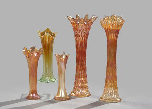 Iridescent Marigold Carnival Glass Vases: Suite of Five Iridescent Marigold Carnival Glass Vases, mid-20th century, consisting of a tall "Rustic" example; a tall modified "Rustic" example with a crimped edge; a smaller fine rib example; and t