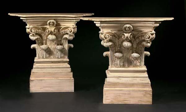 NEOCLASSICAL CONSOLE TABLES: Pair of Wood and Cast-Plaster Columnar Console Tables, in the neoclassical taste, the shaped wooden and stepped molded tops having concave fronts above a square composite capital mounted on an oblong