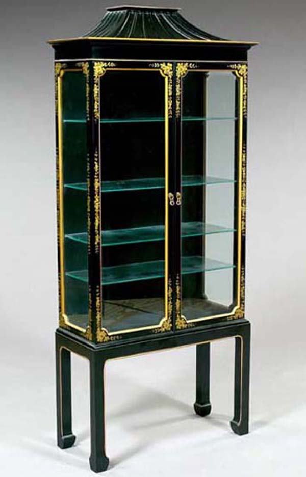 ENGLISH CHINOISERIE VITRINE: English Carved, Black-Lacquered and Parcel-Gilt Chinoiserie Two-Door Vitrine, in the style of Thomas Chippendale, the glass doors beveled, the interior fitted for four plate glass shelves, electrified