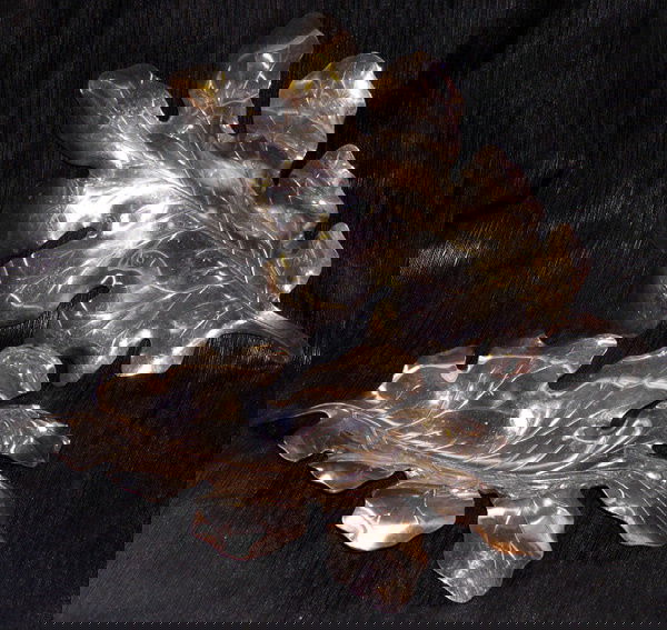 APOLLO STUDIOS STERLING SILVER DISH: Pair of Sterling Silver Dishes, by Apollo Studios of New York, mid-2oth century, each in the form of a naturalistic oak leaf with embossed veining, l. 10".