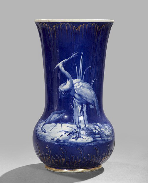 Blue and White Porcelain Umbrella Stand,: Blue and White Porcelain Umbrella Stand, late 19th century, unmarked, having a royal blue ground and featuring two white herons by the waterfront, with gilt highlights, h. 22-1/2", dia. 12".