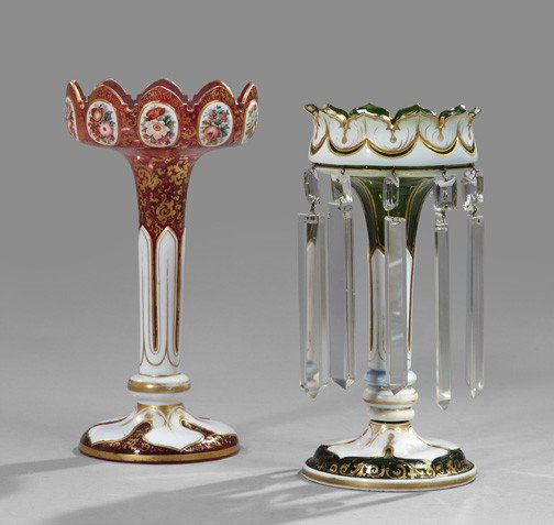 Two Bohemian Overlay Glass Lustres,: Two Bohemian Overlay Glass Lustres, third quarter 19th century, one example with white and gilt overlay over a ruby and gold-painted ground, the rim with "Floral Medallions"; the other example with wh