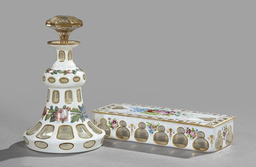 Bohemian Cased Glass Table Articles: Group of Two Bohemian Cased Glass Table Articles, third quarter 19th century, consisting of a perfume bottle with a paneled stopper and a rectangular covered box, both with white overlay over gilt-acc