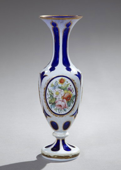 Bohemian Cut-to-Cobalt Glass Flared Vase: Bohemian White Cut-to-Cobalt Glass Flared Vase, fourth quarter 19th century, the central body with three oval reserves with floral bouquets, h. 15", dia. 4-3/4".
