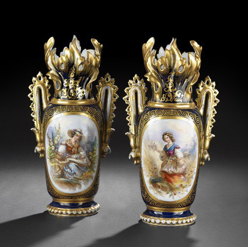 Franco-Bohemian Porcelain Garniture Vases: Pair of Franco-Bohemian Porcelain Garniture Vases, third quarter 19th century, having cobalt grounds and richly gilded and polychromed in the rococo taste, each facade with a different oval reserve of