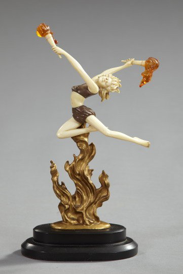 F. Preiss (French, b. 1882),: F. Preiss (French, b. 1882), a cast -brass and faux-ivory figure of a lady with two torches, the base marked "Made in France", h. 16", w. 8", d. 4".