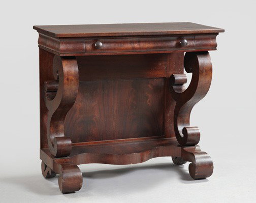 American Mahogany Pier Table: American Late Classical Revival Mahogany Pier Table, first quarter 20th century, the rectangular top over a cyma-molded apron fitted with a drawer, supported by scroll columns joined to a serpentine l