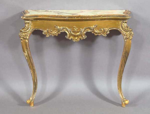 PAIR FRENCH GILDED CONSOLE TABLES: Pair of Louis XV-Style Giltwood and Onyx-top Console Tables, early 20th century, each with shell and scroll-carved aprons, raised on cabriole legs ending in curled feet, h. 31-1/2", w. 32", d. 10-1/2"