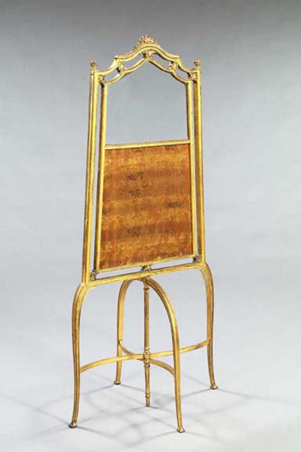 FRENCH GILTWOOD FOLDING SCREEN: French Carved Giltwood Folding Boudoir Screen, first quarter 20th century, the upper panel of glass, the lower panel in period floral damask, the quatrepodal base folding flat, h. 54".