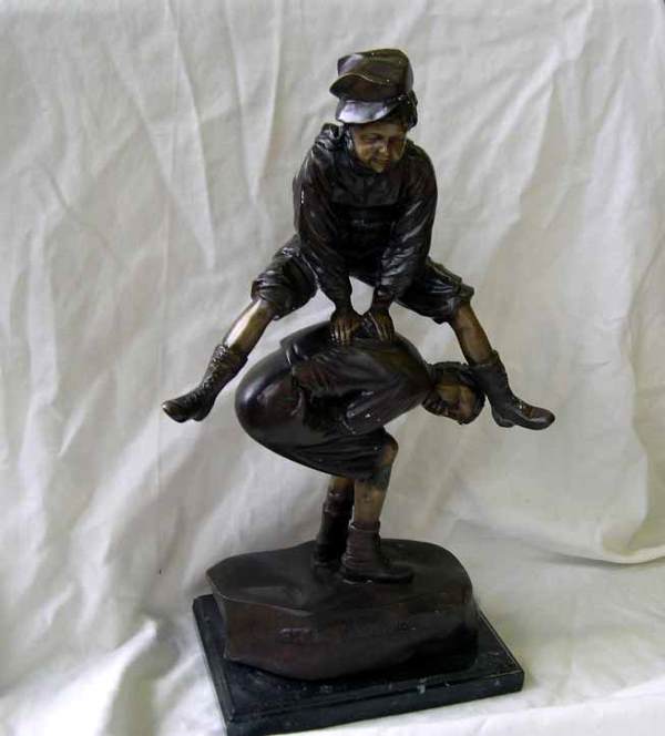 ALEX BROWN PATINATED BRONZE: After Alex Brown (American, 1865-1942) "Leapfrog", a double-patinated bronze figure group of two boys in c. 1900 garb playing leapfrog, the rock-like base prominently signed: "Alex Brown", presented o