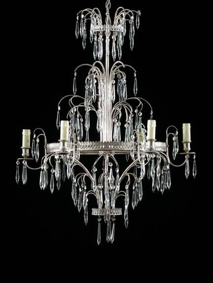Attractive Art Deco Silvered Nickel Six-Light Chan: Attractive Art Deco Silvered Nickel Six-Light Chandelier, in the neoclassical taste, c. 1920, dressed throughout with facet-cut paneled glass spears, electrified and fitted with faux candles, h. 33",