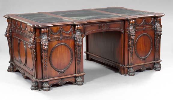 Monumental English Carved Mahogany Partner's Desk: Monumental English Carved Mahogany Partner's Desk, facsimile of the renowned Thomas Chippendale model from Nostell Priory, the pedestals carved with lion-masque pilasters and opening to reveal folio c