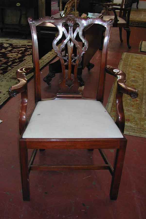 George III-Style Mahogany Armchair: George III-Style Mahogany Armchair, in the manner of Thomas Chippendale, having a pierce-shaped splat centered by a trefoil, the quadrangular legs joined by an "H"-stretcher, h. 39-1/2".