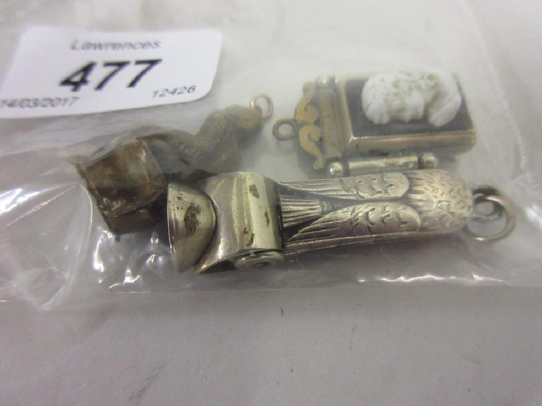 Three various cigar cutters including an owl, a cameo (1 of 1)