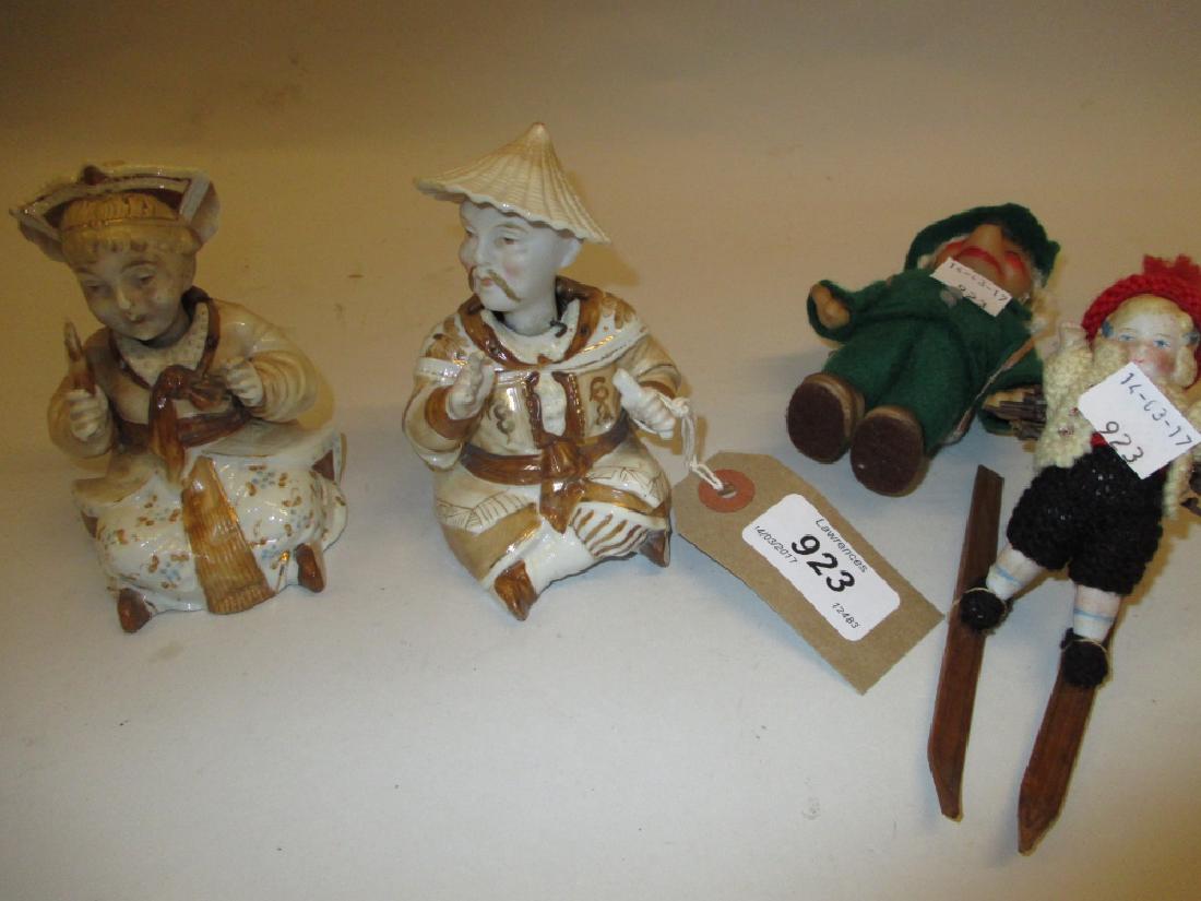 Pair of Continental porcelain nodding head figures of (1 of 1)