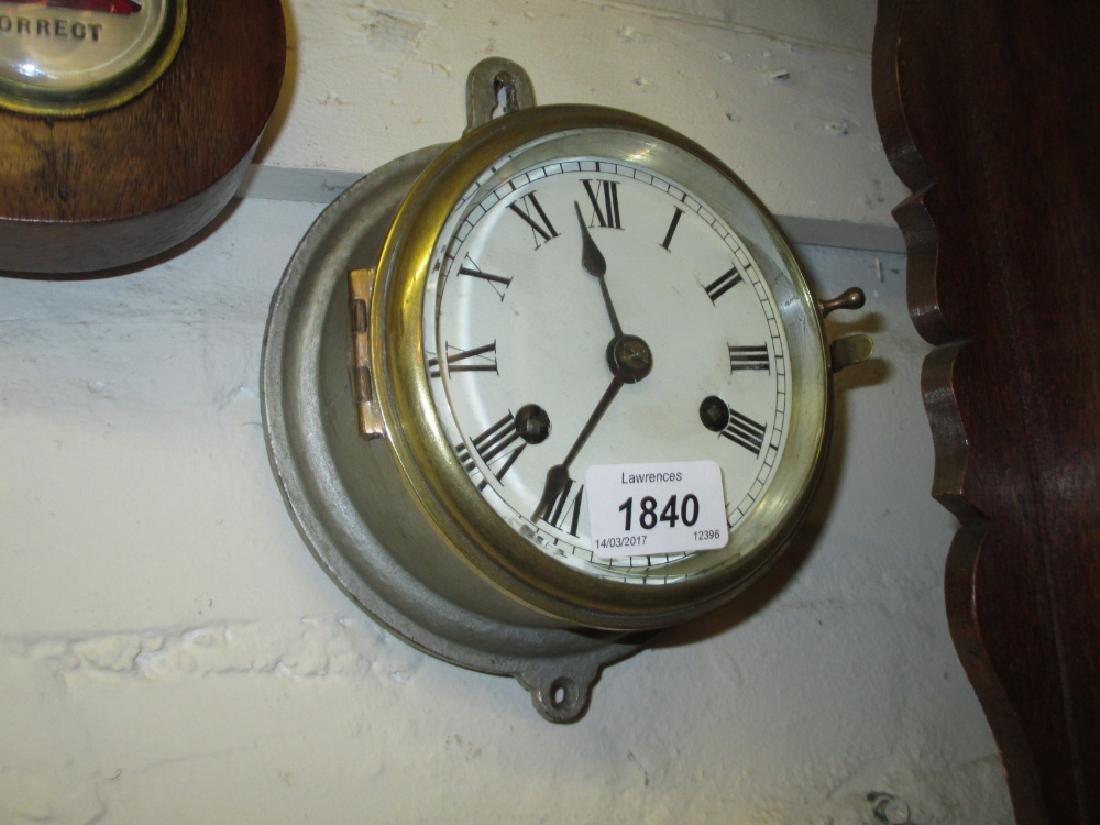 Small silvered metal cased ship's bulk head clock with (1 of 1)