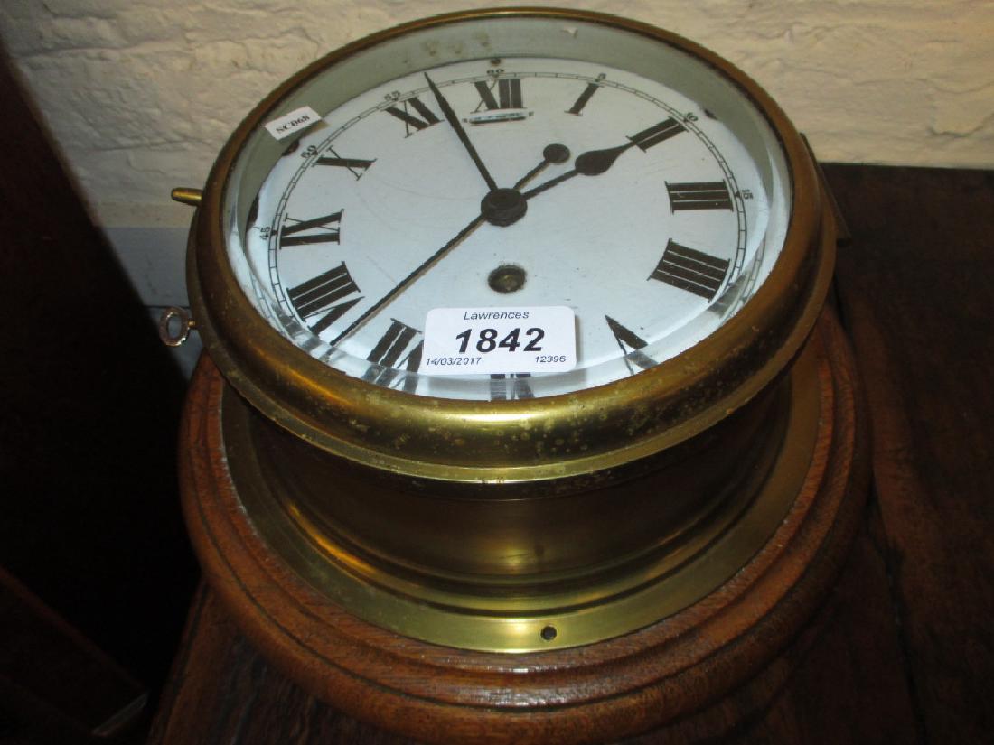 Oak and brass ship's bulk head clock, the enamel dial (1 of 1)