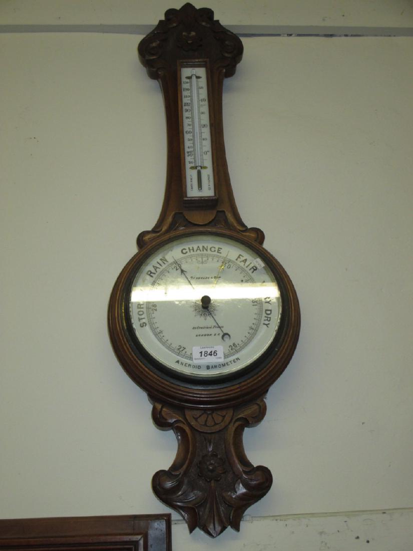 Early 20th Century carved walnut aneroid barometer / (1 of 1)