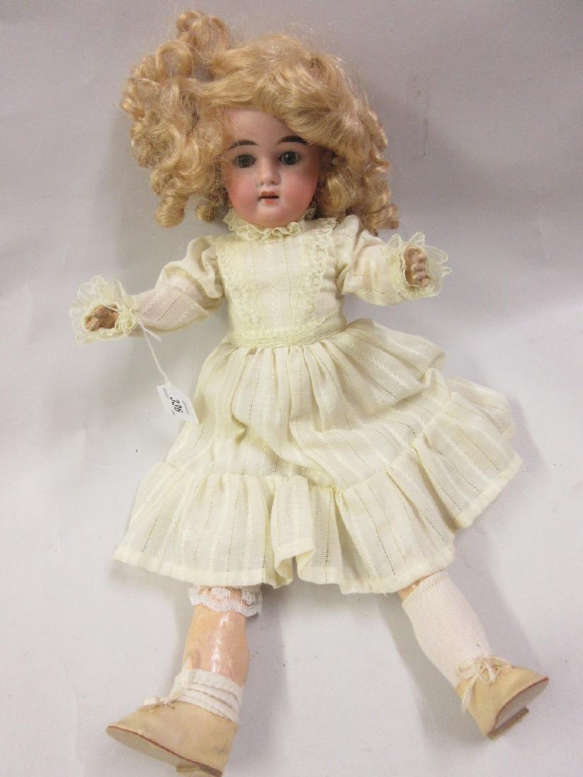 Early 20th Century bisque headed doll with jointed (1 of 1)