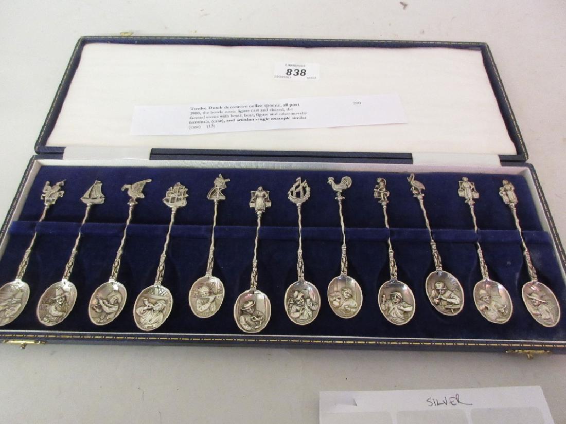 Cased set of twelve Dutch silver spoons with decorative (1 of 1)