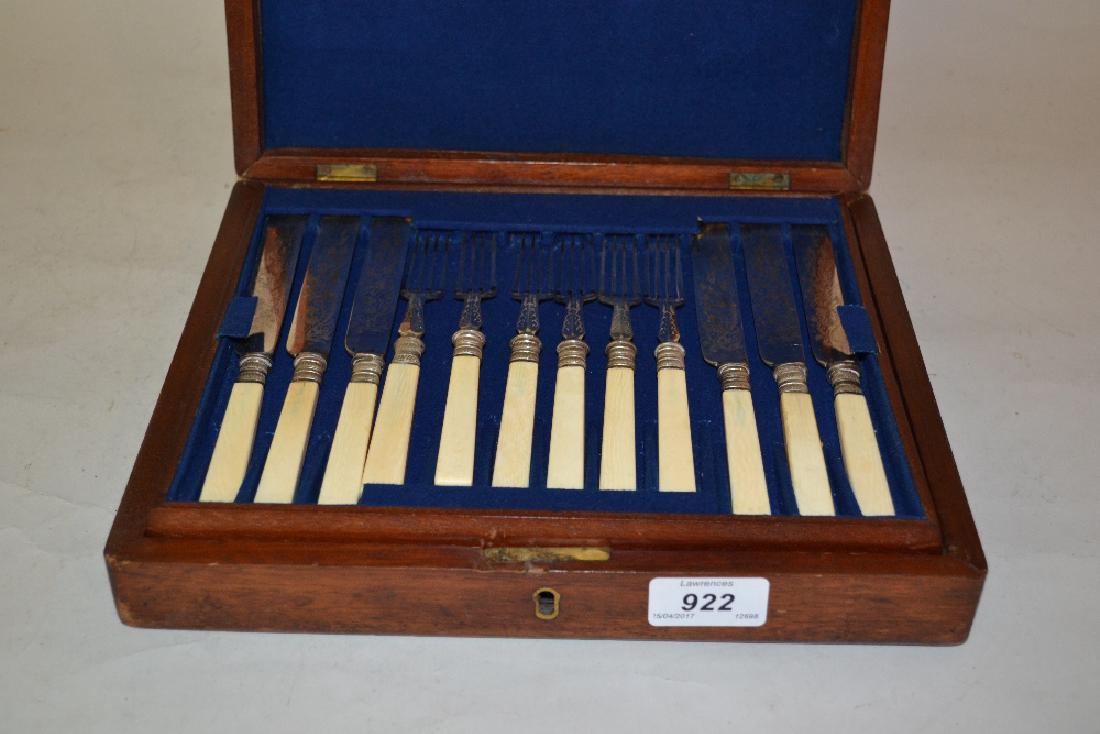 Mahogany cased set of twelve plated fruit knives and: Mahogany cased set of twelve plated fruit knives and forks with ivory handles