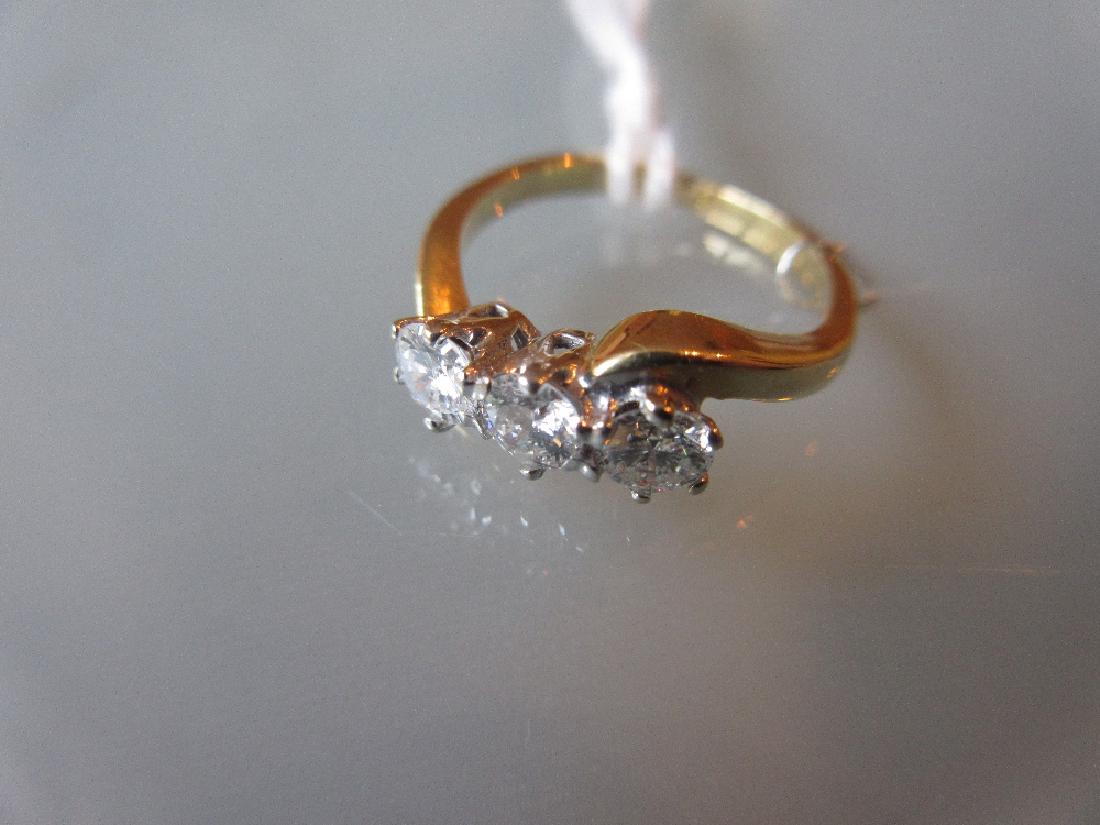 18ct Yellow gold three stone diamond crossover ring (1 of 1)