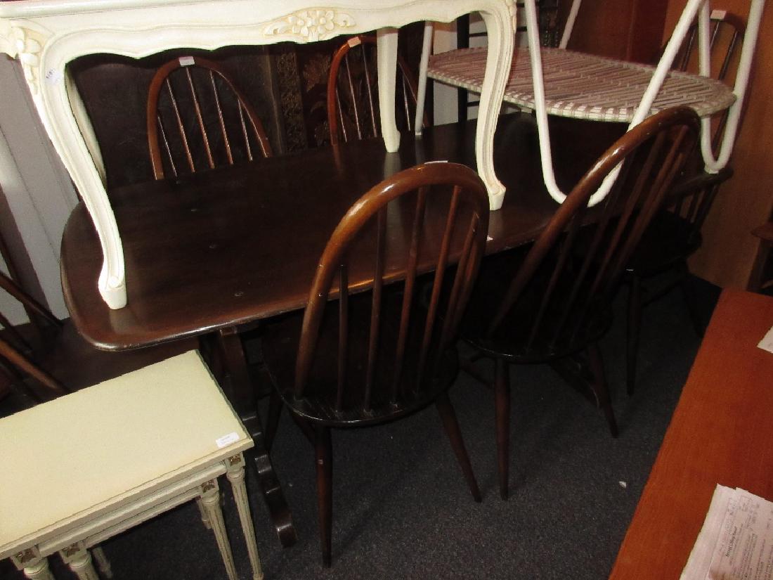 Ercol dark elm rectangular dining table with six: Ercol dark elm rectangular dining table with six matching stick back chairs