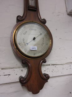 Victorian oak barometer thermometer by Thomas Armstrong: Victorian oak barometer thermometer by Thomas Armstrong and Brother Ltd, Manchester, Liverpool and London