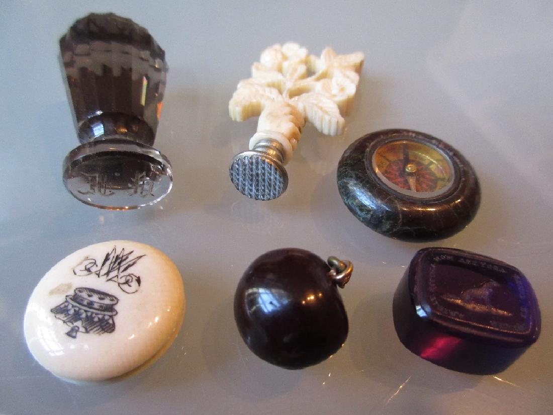 Small bag containing various seals, miniature compass (1 of 1)