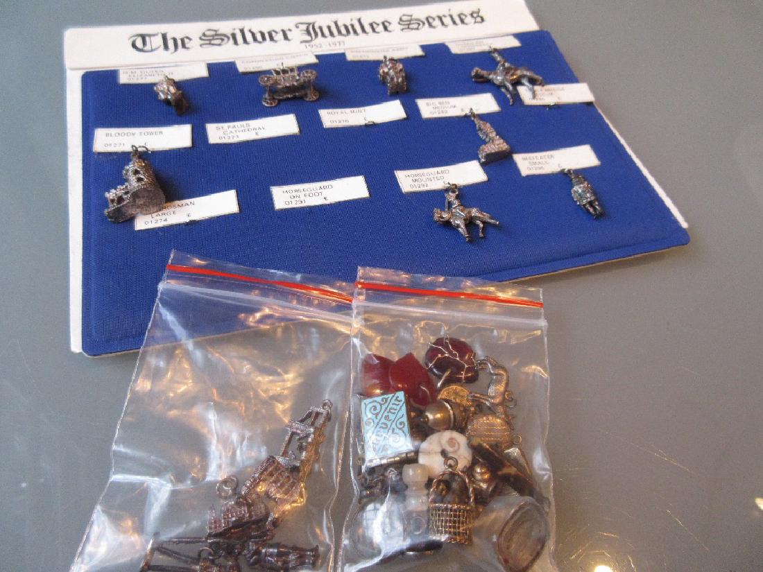 Collection of Silver Jubilee series silver charms, (1 of 1)