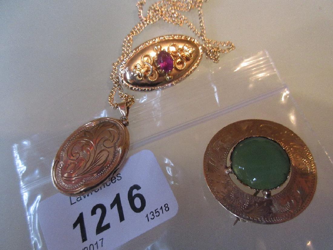 Two gold brooches, together with a 9ct gold photograph (1 of 1)