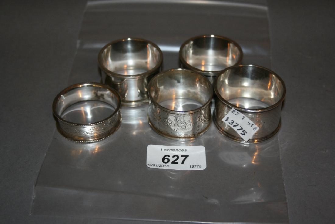Five various silver napkin rings: Five various silver napkin rings