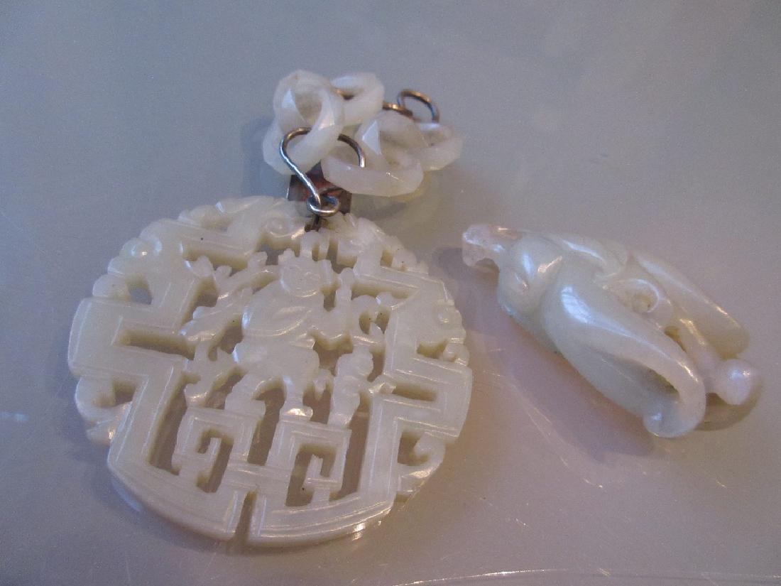 Chinese circular pierced and carved pale green jade (1 of 10)