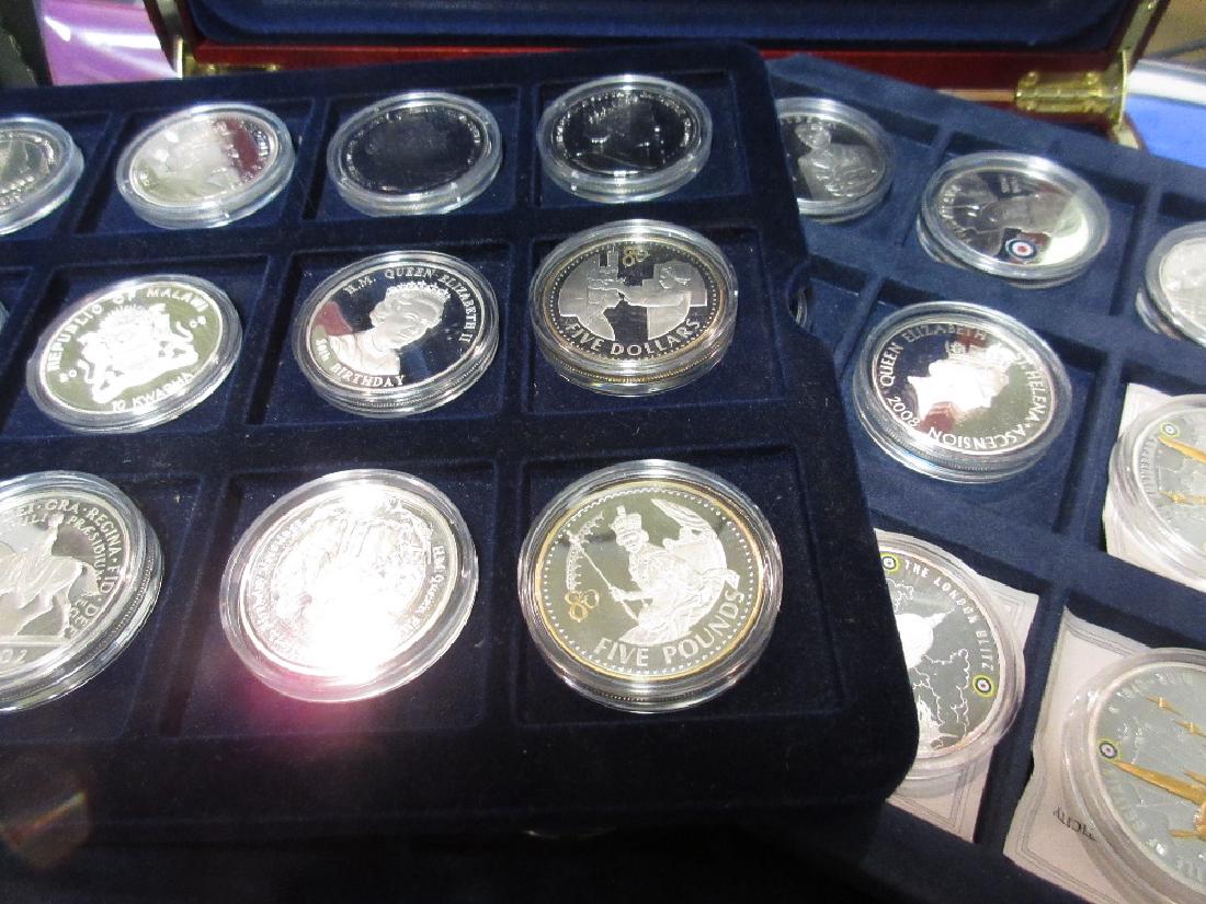 Four silver proof one pound coins, four similar two: Four silver proof one pound coins, four similar two pound coins, two fifty pence coins and three large silver commemorative coins together with a quantity of other cupro nickel commemorative coins, ma