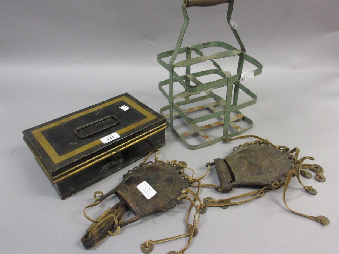 Tin cash box, metal bottle carrier and two bronze and: Tin cash box, metal bottle carrier and two bronze and leather mounted flasks, possibly African