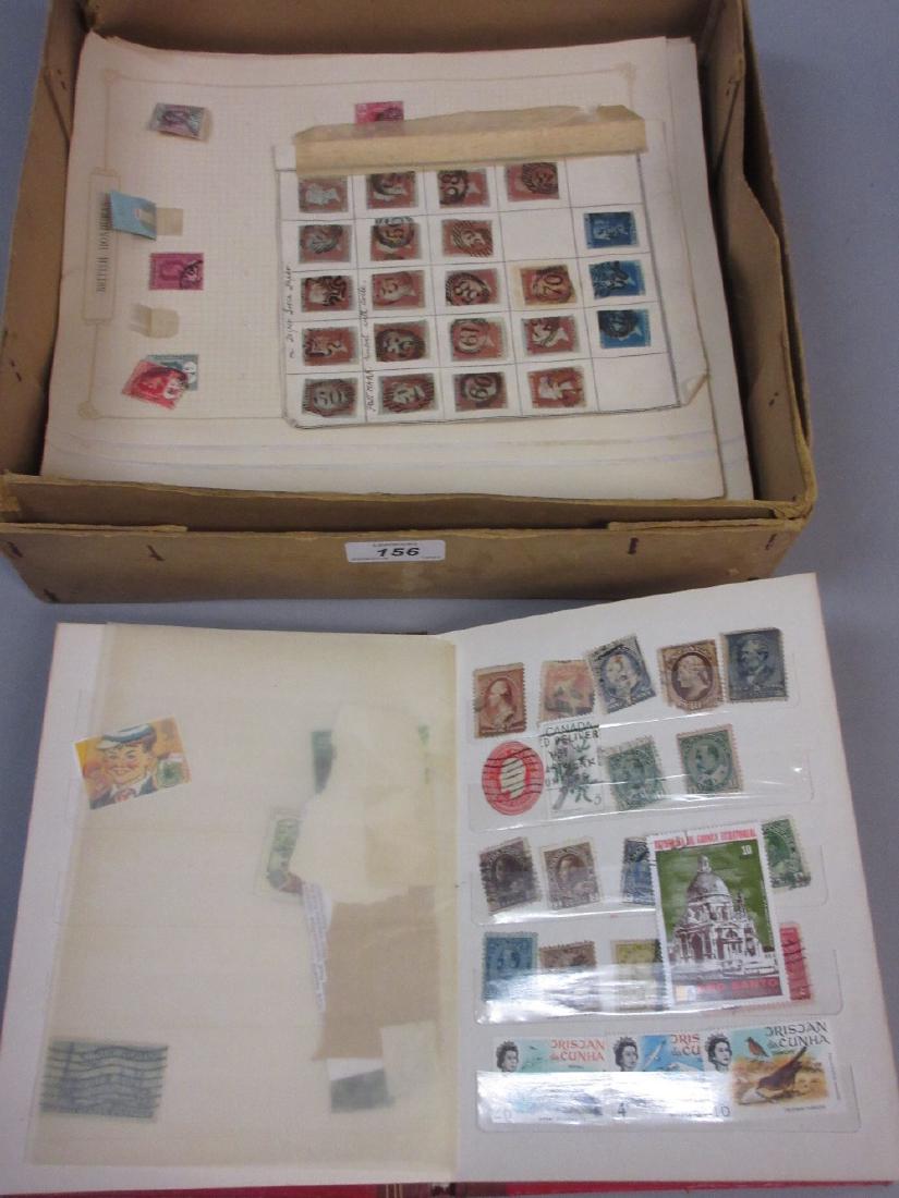 Small stock book of World stamps together with a (1 of 1)