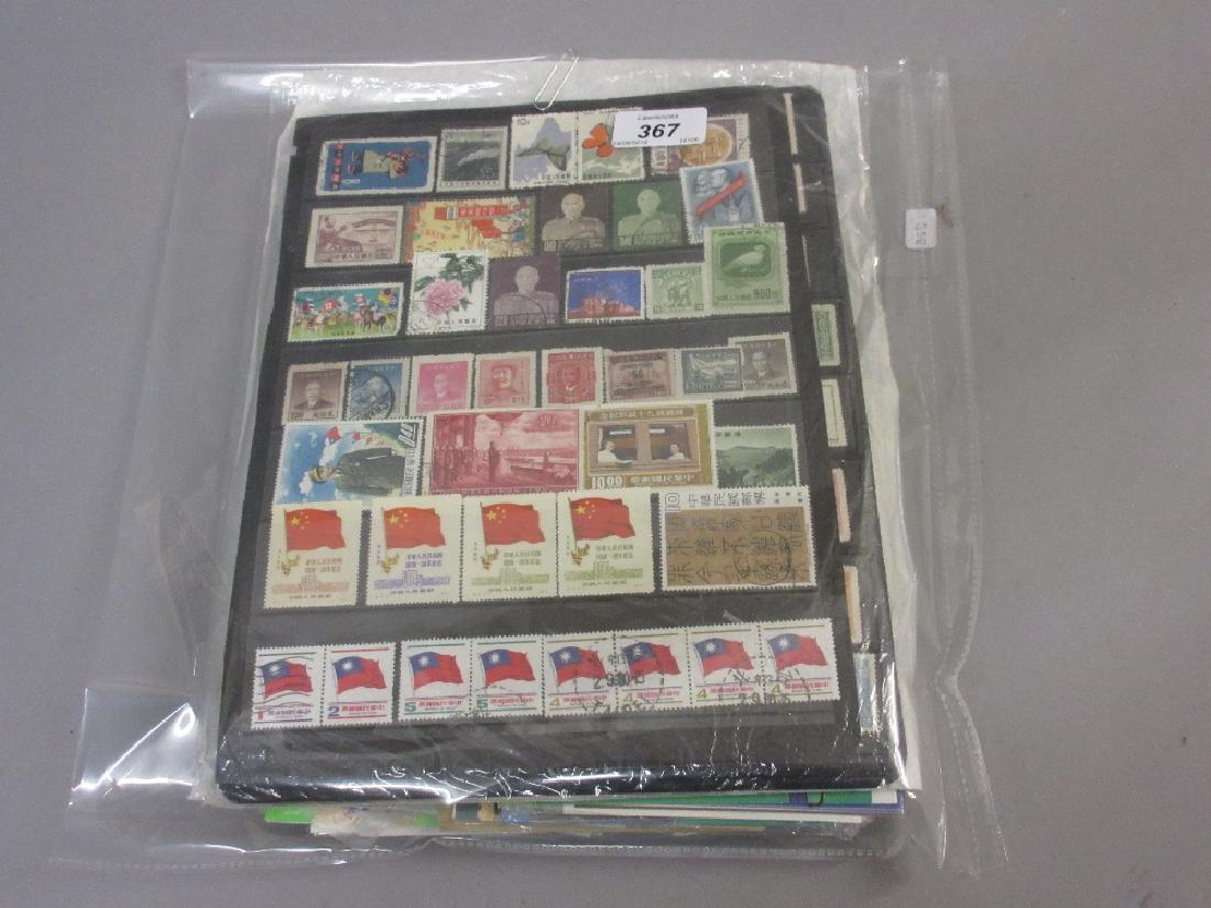 Quantity of loose stock pages containing a collection: Quantity of loose stock pages containing a collection of Chinese stamps and mint Japanese