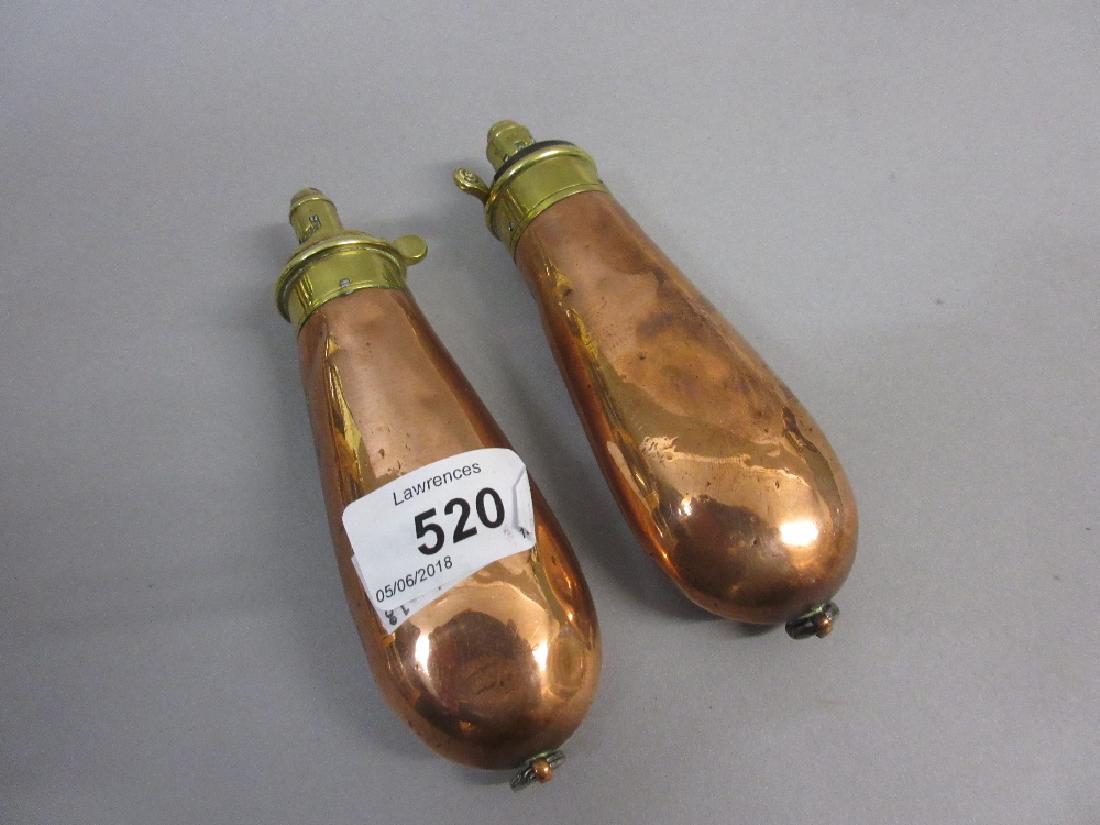 Two small 19th Century brass mounted copper shot flasks: Two small 19th Century brass mounted copper shot flasks