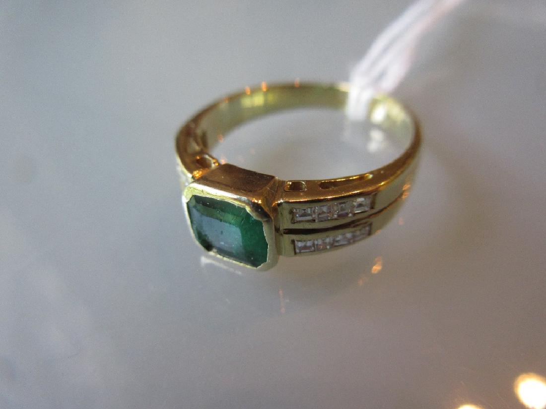 Yellow gold emerald set ring with diamond set shoulders (1 of 1)