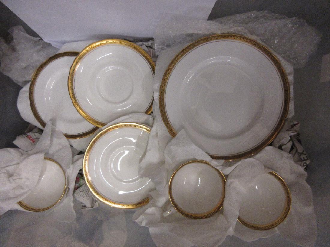 Tuscan fine Bone China part dinner service with gilt: Tuscan fine Bone China part dinner service with gilt Greek key pattern border, comprising: nine tea cups, twenty small plates, twenty side plates, thirteen soup bowl stands, eleven soup bowls, eight d