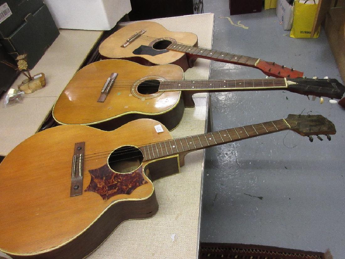Group of three acoustic guitars (at fault) including (1 of 1)