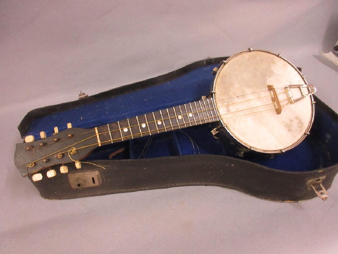 Early 20th Century mandolin banjo in a fitted case (1 of 2)