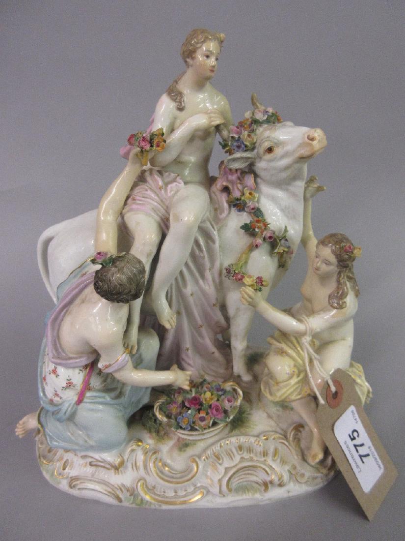 19th Century Meissen group of Europa with bull and: 19th Century Meissen group of Europa with bull and accompanying figures, blue cross swords and incised marks to base (damages and restorations), 8.25ins high