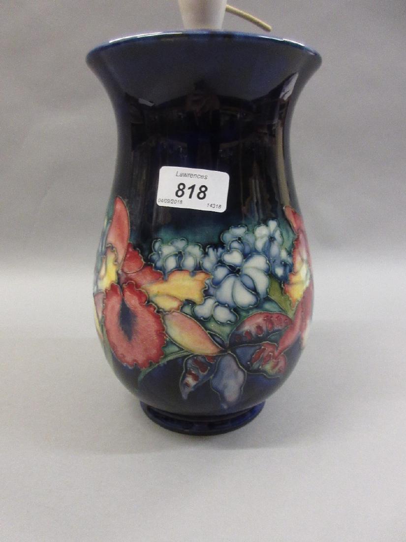 Moorcroft floral tube lined pottery table lamp on a