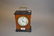 Small French walnut and ebonised mantel clock