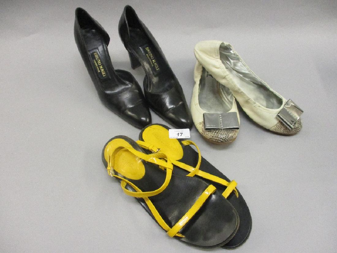 Pair of ladies Bruno Magli black leather cut away court: Pair of ladies Bruno Magli black leather cut away court shoes, size 38 having original dust bag, together with a pair of Bruno Magli flat sandals and a pair of DKNY flat pumps, size 39
