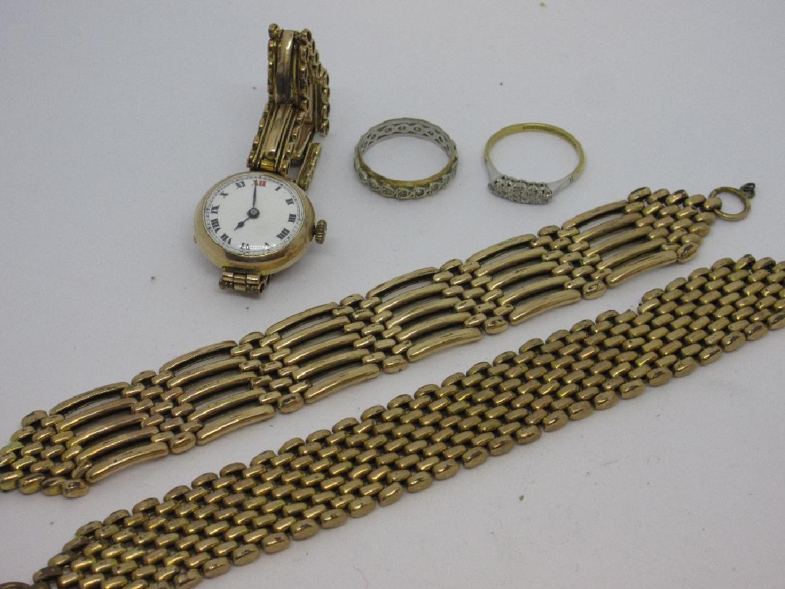18ct Yellow gold diamond chip set ring, 9ct gold full: 18ct Yellow gold diamond chip set ring, 9ct gold full eternity ring, 9ct gold cased ladies wristwatch with later plated strap and two gold plated chain link bracelets