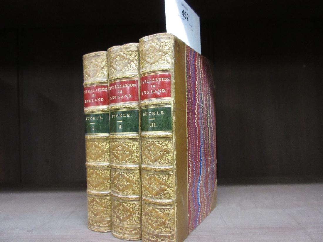Three volumes, ' History of Civilisation in England ': Three volumes, ' History of Civilisation in England ' by Henry Thomas Buckle, published London 1882, by Longmans Green, bound in half leather with marbled end papers and boards, having decorative spin