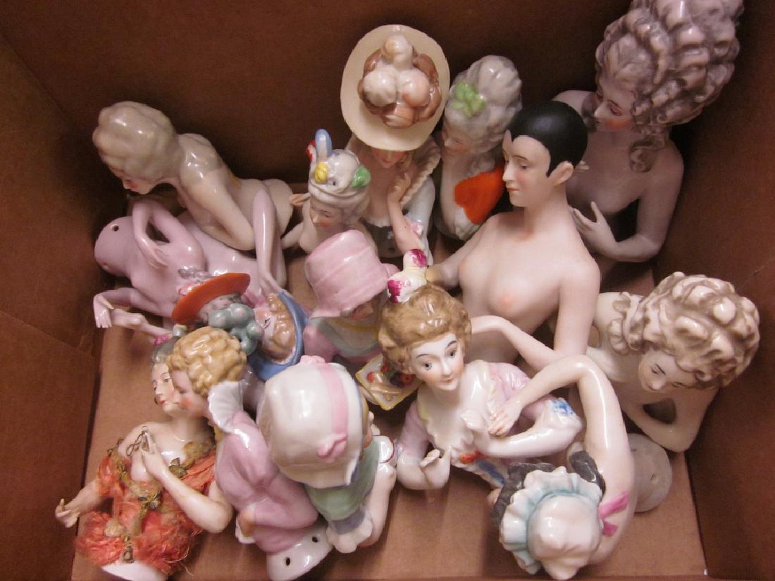Box containing a collection of fifteen various large: Box containing a collection of fifteen various large porcelain half dolls, together with a similar reclining nude doll